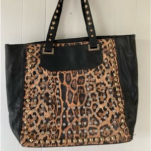 Ladies leopard and rhinestone handbag.